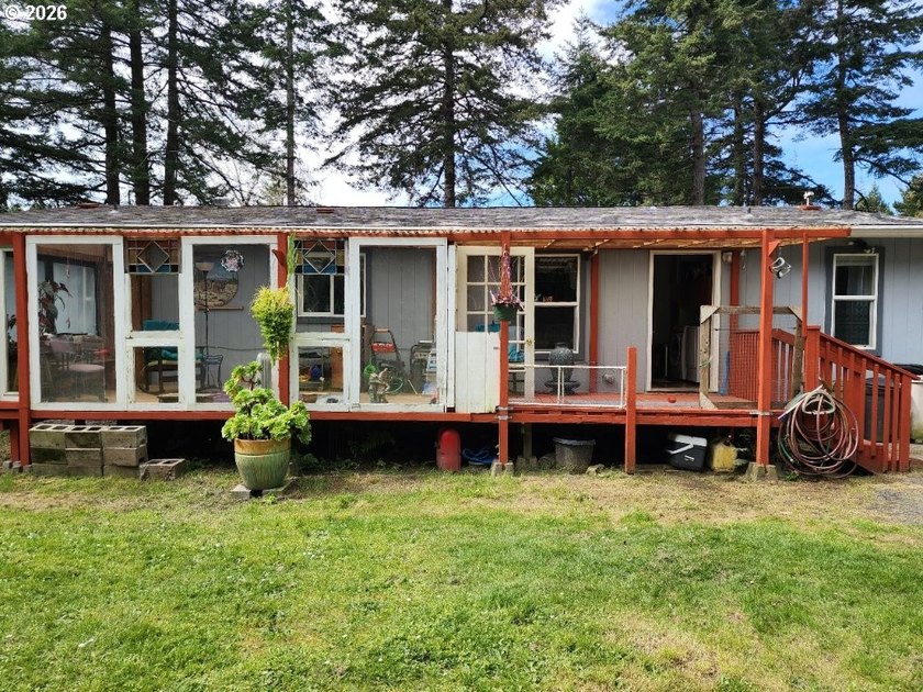 Tucked away among the trees on 1.16 private acres with a Large - photo 34