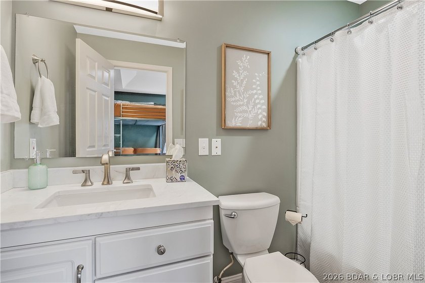 Luxury lakefront home for sale at the highly desirable 1 Mile - photo 29