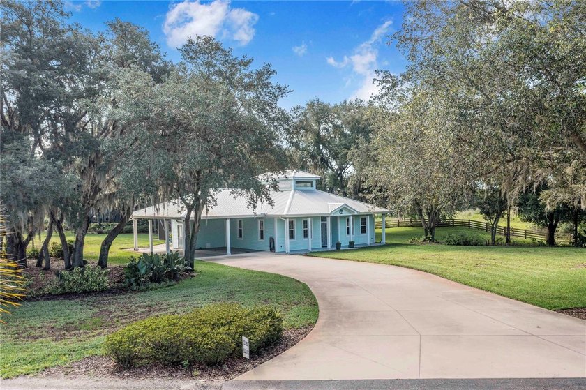 Experience refined country living on 6.36 picturesque acres in - photo 4