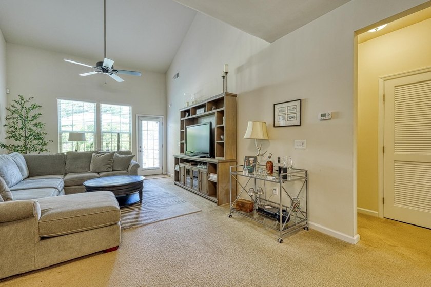 Enjoy low-maintenance living in the highly desirable River Falls - photo 3