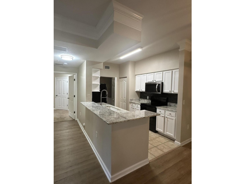 Simply Stunning!! Sought after and rarely available 3 bed 2 bath - photo 13
