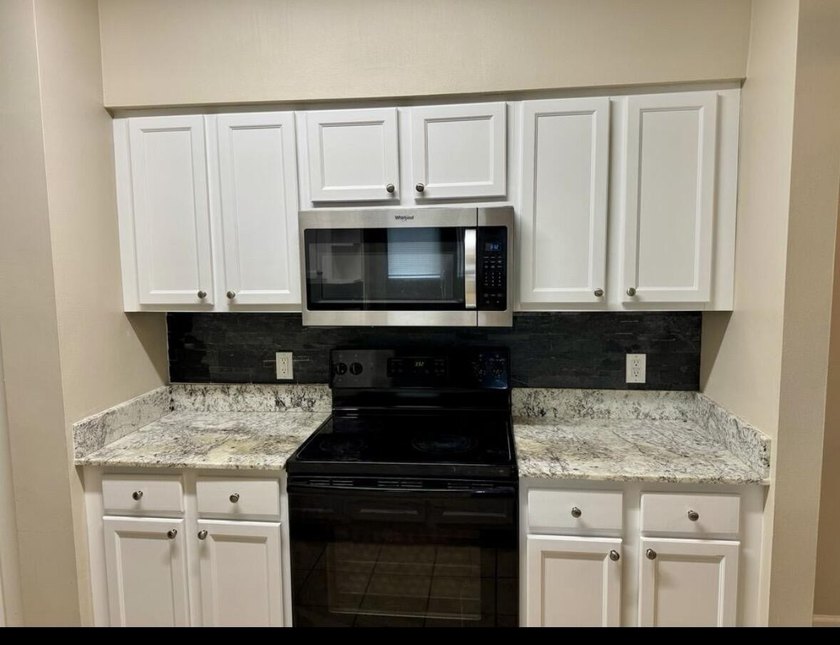 Simply Stunning!! Sought after and rarely available 3 bed 2 bath - photo 15
