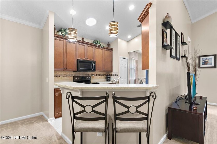 Welcome to this impeccably maintained, beautifully upgraded home - photo 9