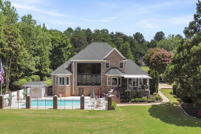Welcome to 227 Woodlake Dr, an extraordinary lakefront retreat - photo 2