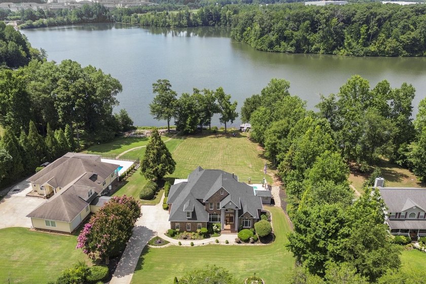 Welcome to 227 Woodlake Dr, an extraordinary lakefront retreat - photo 3