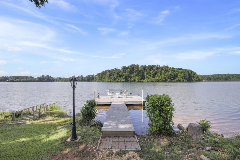 Welcome to 227 Woodlake Dr, an extraordinary lakefront retreat - photo 4