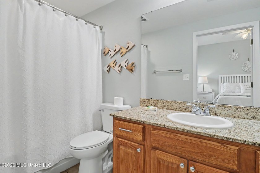 Experience coastal living at its finest in this beautifully - photo 11