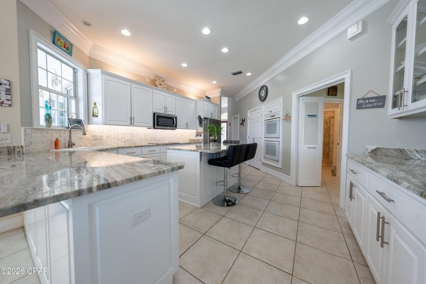 Welcome to waterfront living in the highly sought-after gated - photo 13