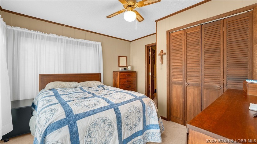 Don't miss this wonderful lake home located at the 8-mile marker - photo 11