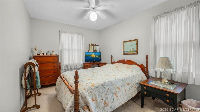 Don't miss this wonderful lake home located at the 8-mile marker - photo 12