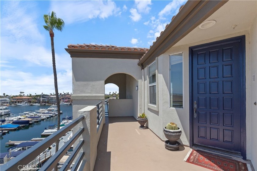 Welcome to luxury coastal living in the prestigious Bay Club - photo 2
