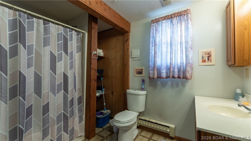 Don't miss this wonderful lake home located at the 8-mile marker - photo 14