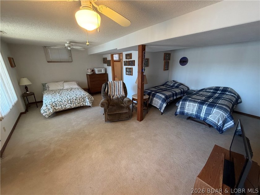 Don't miss this wonderful lake home located at the 8-mile marker - photo 23