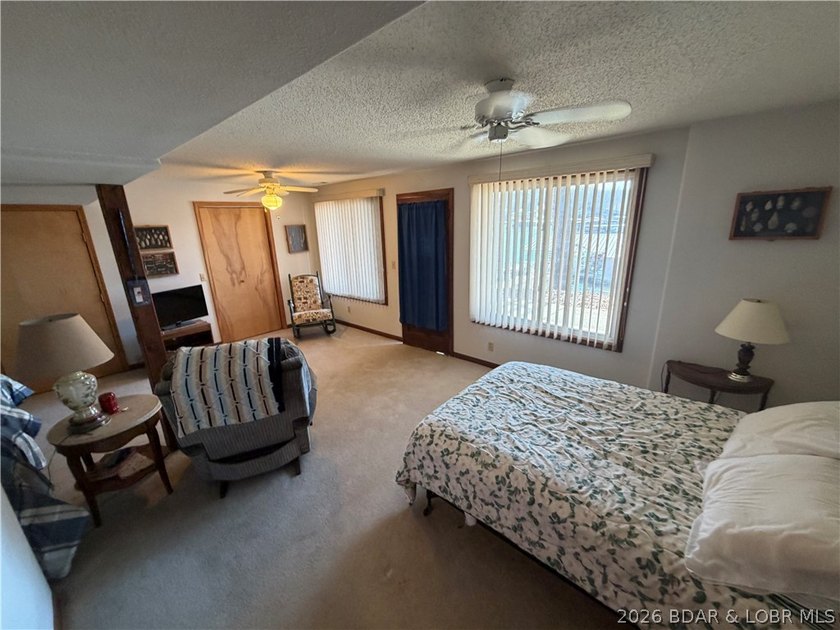 Don't miss this wonderful lake home located at the 8-mile marker - photo 24