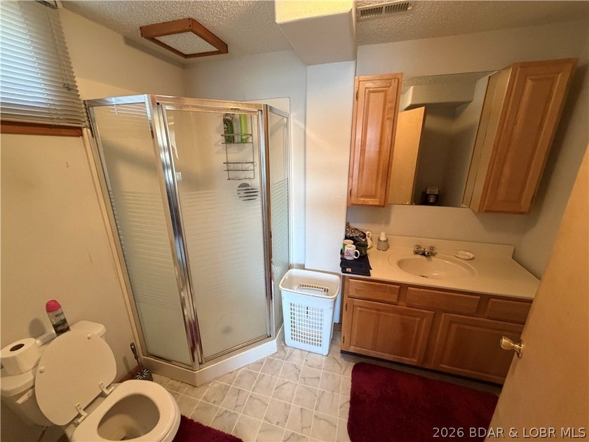 Don't miss this wonderful lake home located at the 8-mile marker - photo 25