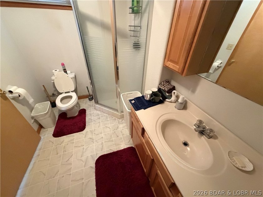 Don't miss this wonderful lake home located at the 8-mile marker - photo 26