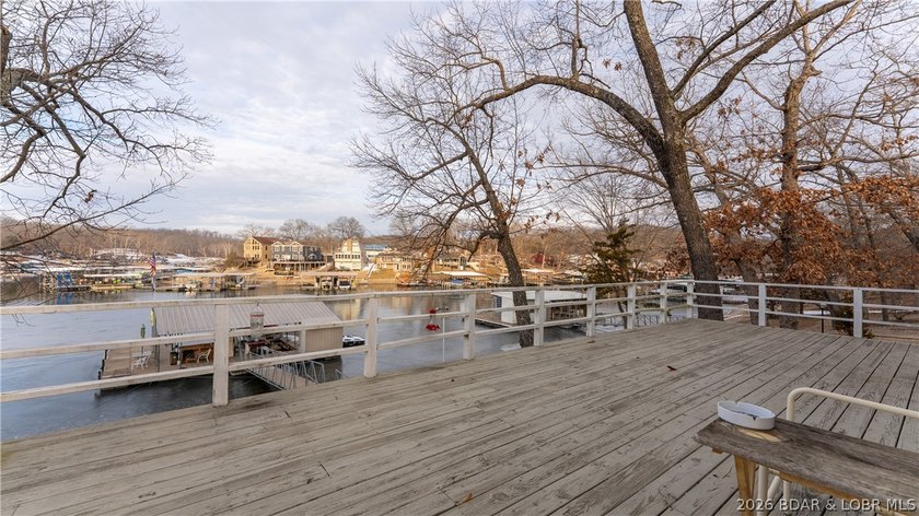 Don't miss this wonderful lake home located at the 8-mile marker - photo 30