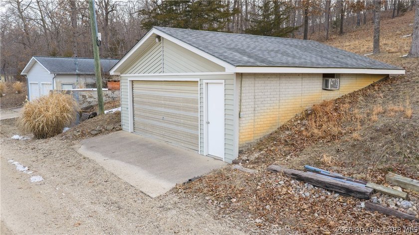 Don't miss this wonderful lake home located at the 8-mile marker - photo 33