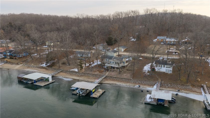 Don't miss this wonderful lake home located at the 8-mile marker - photo 34