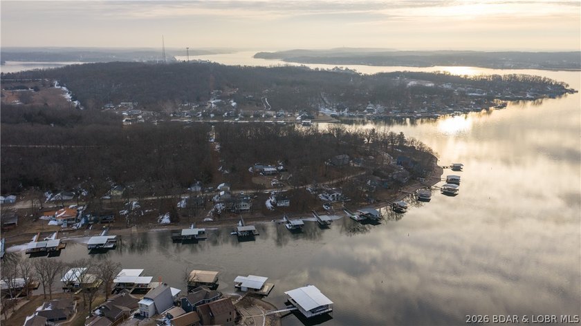 Don't miss this wonderful lake home located at the 8-mile marker - photo 38
