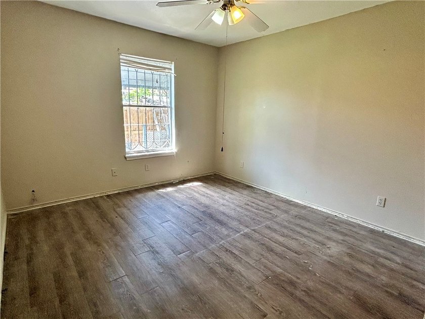 Opportunity awaits with this three-bedroom, two-bath home full - photo 11