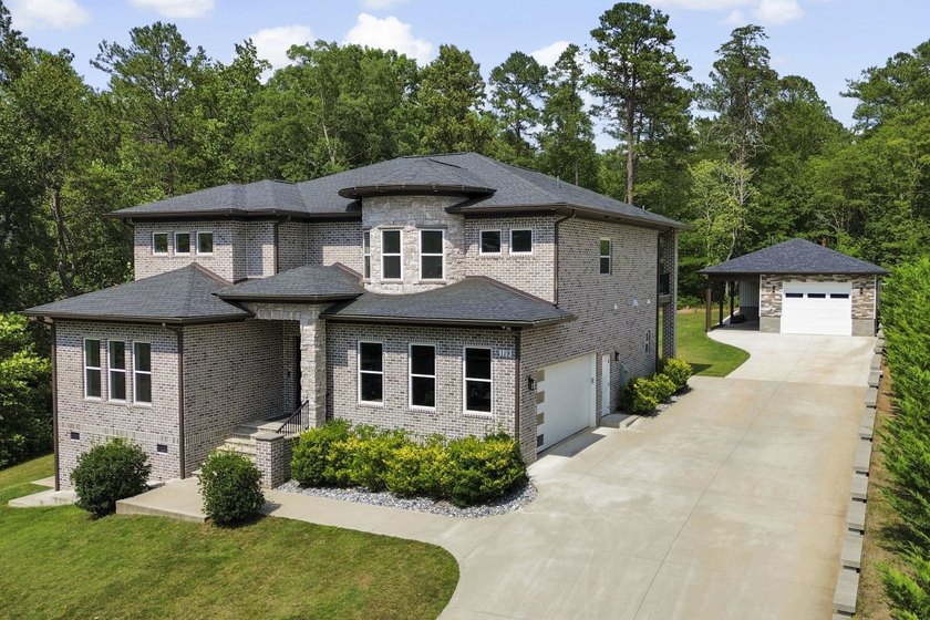 This stunning all-brick home sits on .71 acres and offers 3,250 - photo 2