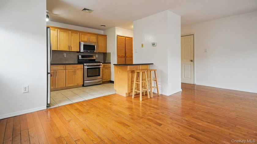 Welcome to this 3-bedroom, 1.5-bath condominium in a gated - photo 12