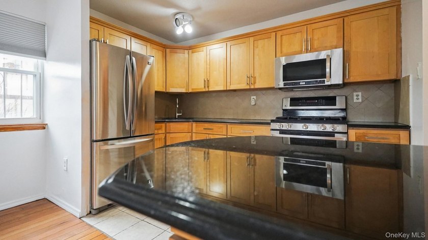 Welcome to this 3-bedroom, 1.5-bath condominium in a gated - photo 15