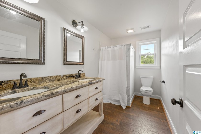 Sellers are taking a loss! This custom-built home with - photo 48
