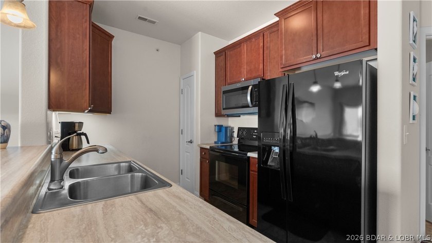 Experience turnkey lakefront living at its finest in this - photo 33