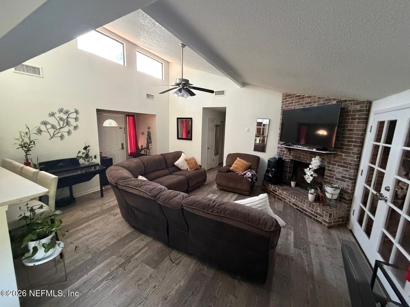Welcome to this beautifully maintained home in the highly - photo 2