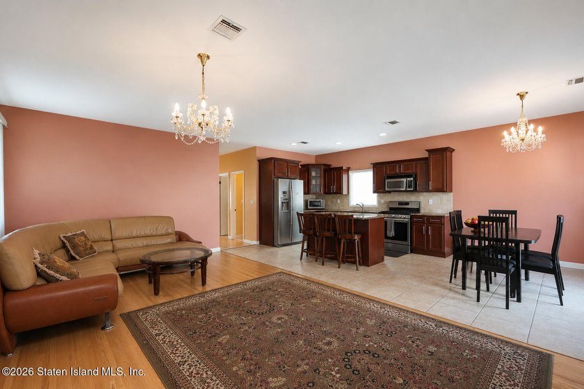This gorgeous 2-family, 4-bedroom, 3-bathroom, side-hall - photo 15