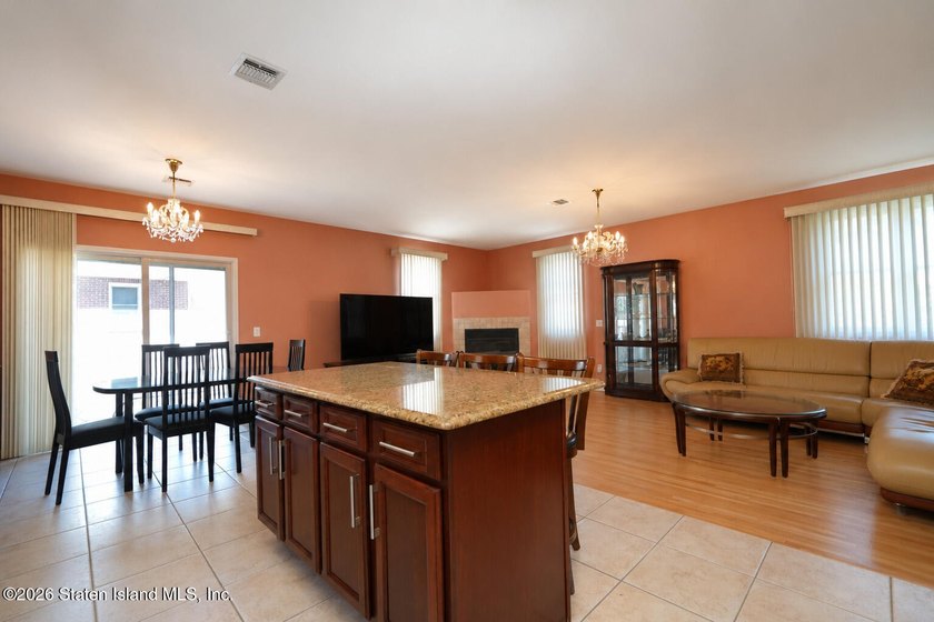 This gorgeous 2-family, 4-bedroom, 3-bathroom, side-hall - photo 17