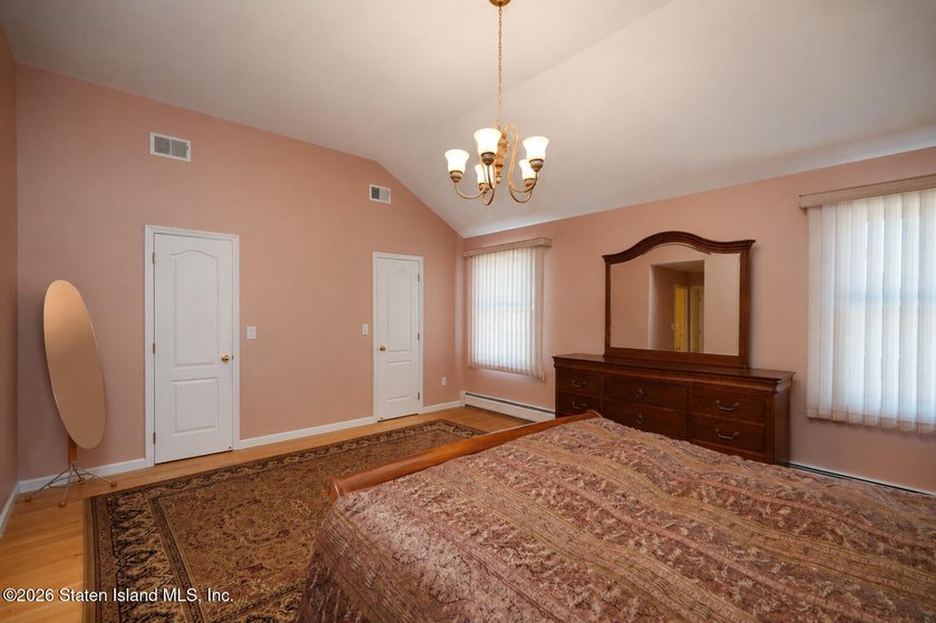 This gorgeous 2-family, 4-bedroom, 3-bathroom, side-hall - photo 23
