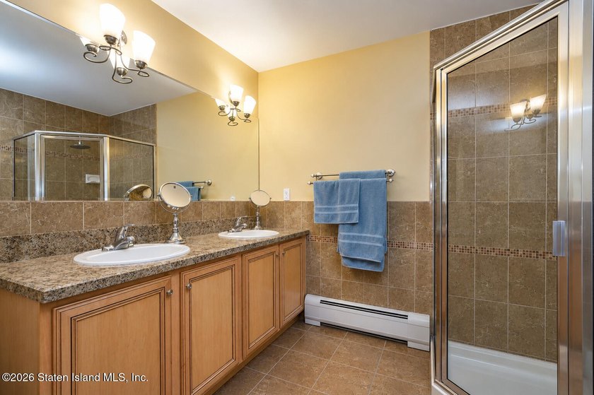 This gorgeous 2-family, 4-bedroom, 3-bathroom, side-hall - photo 25