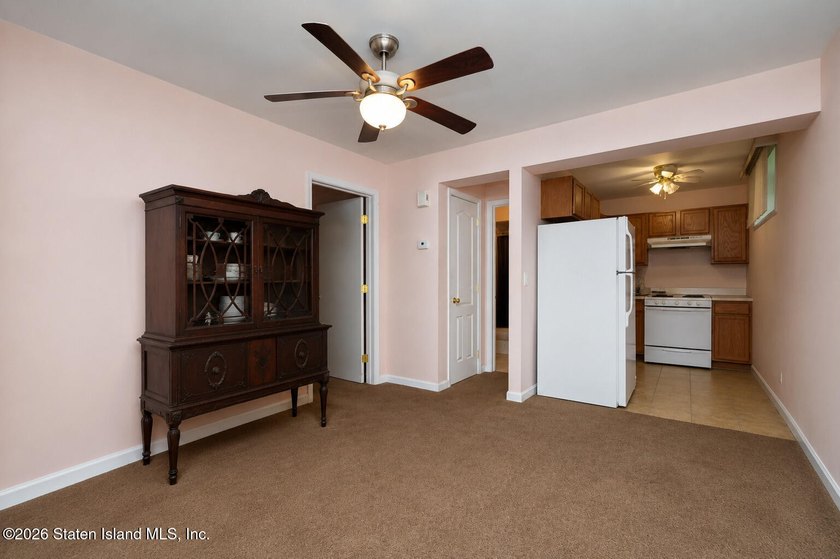 This gorgeous 2-family, 4-bedroom, 3-bathroom, side-hall - photo 37