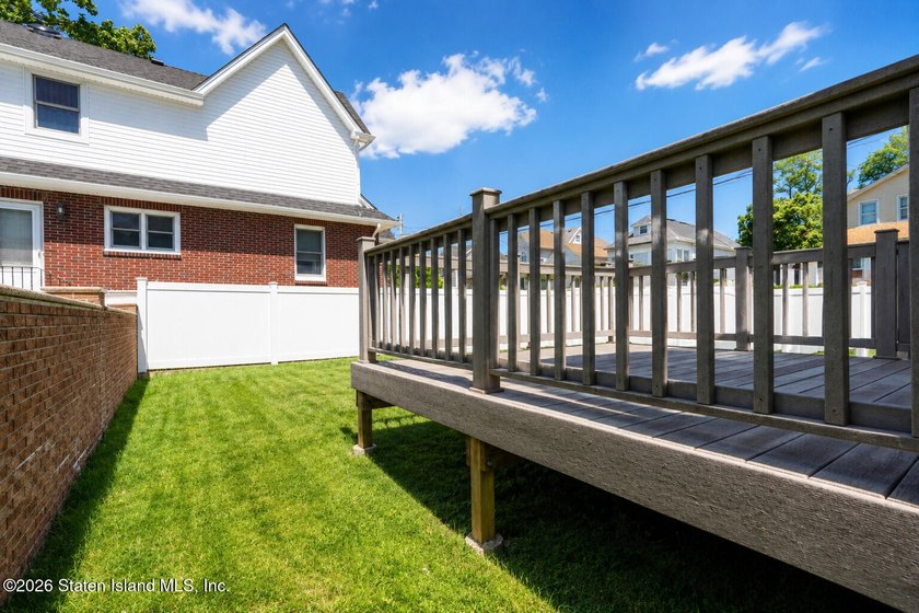 This gorgeous 2-family, 4-bedroom, 3-bathroom, side-hall - photo 43