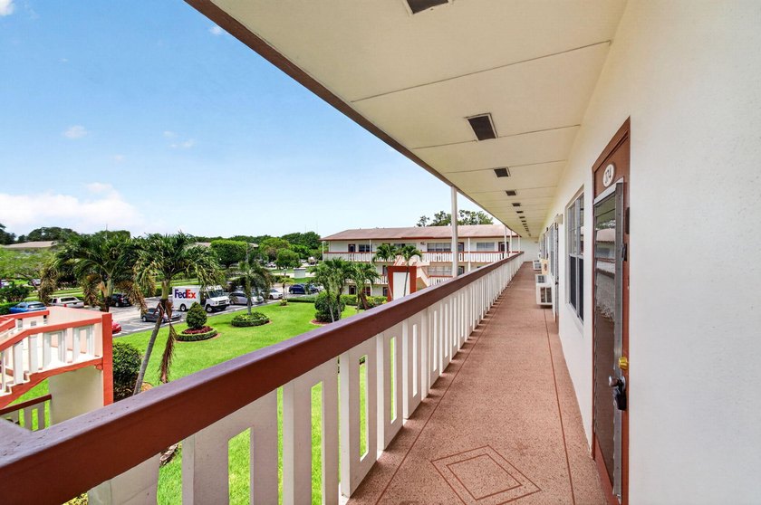 Located on the third and top floor with no neighbors above and - photo 7