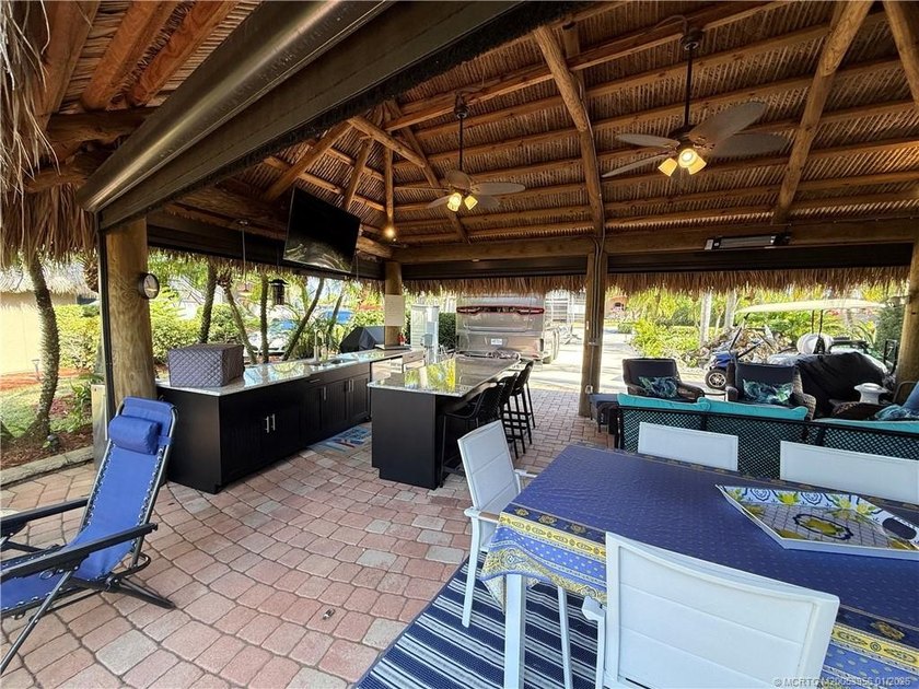 Located on the large lake with double fountains, this is truly - photo 14