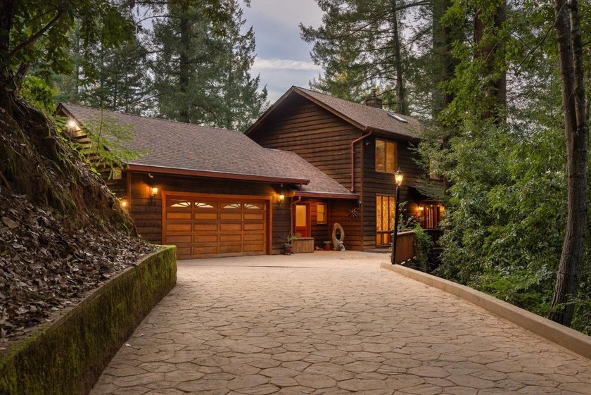 Perched atop a private knoll in the redwoods of the Glenwood - photo 2