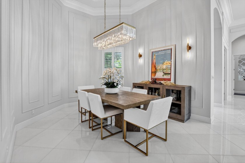 Situated on an oversized lot within the gated community of Azura - photo 4