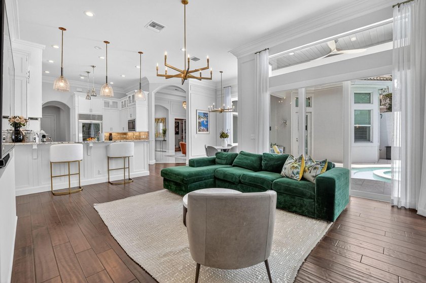 Situated on an oversized lot within the gated community of Azura - photo 5