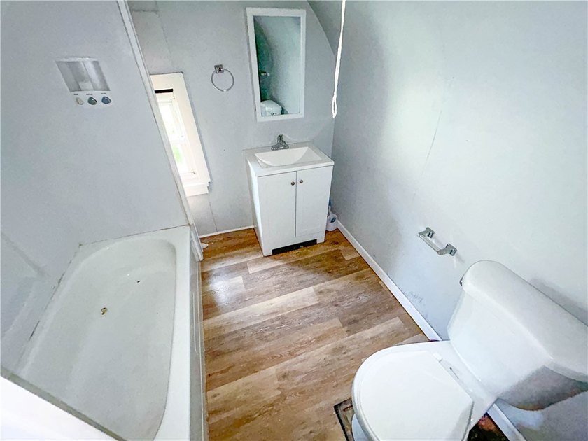 This spacious 4-bedroom, 1.5-bath Colonial in the City of - photo 11
