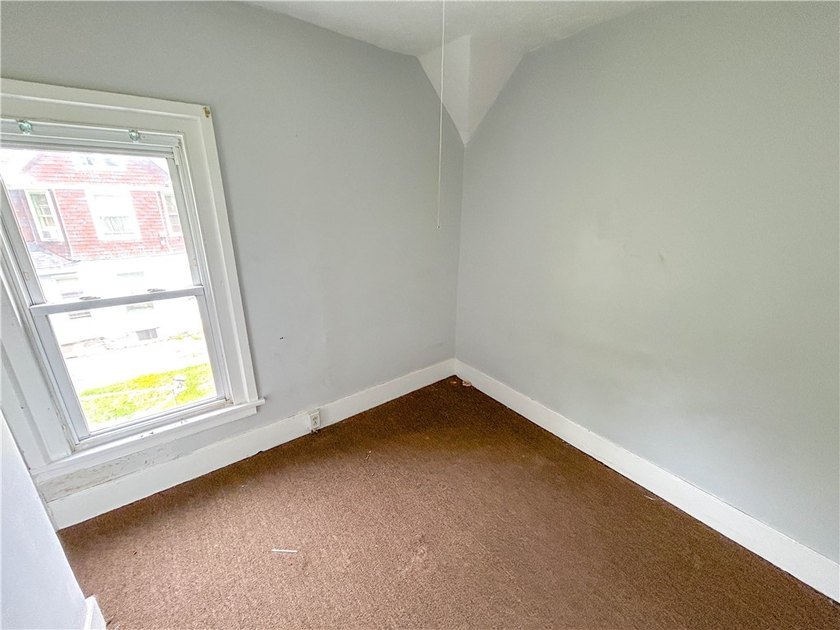 This spacious 4-bedroom, 1.5-bath Colonial in the City of - photo 12