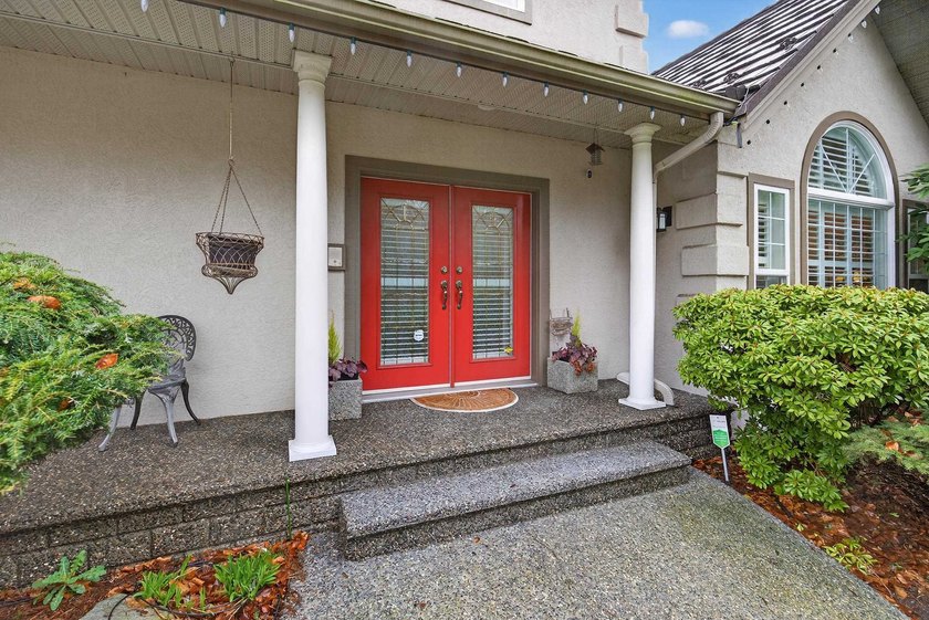 Situated in prestigious Abbey Ridge in Fraser Heights, this - photo 3