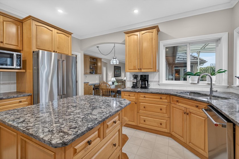 Situated in prestigious Abbey Ridge in Fraser Heights, this - photo 8