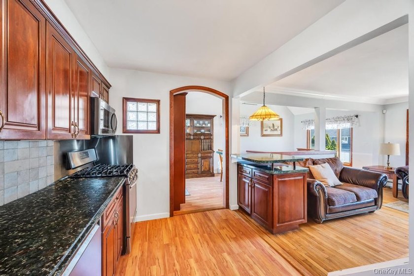 Welcome to this charming 3-bedroom, 2 full bathroom Cape nestled - photo 21