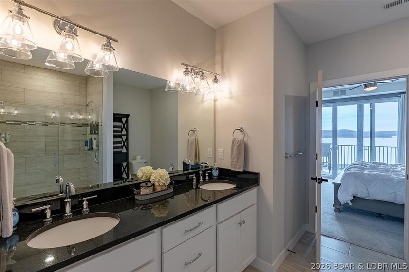 This unit is a true showstopper-defined by class, luxury, and - photo 24