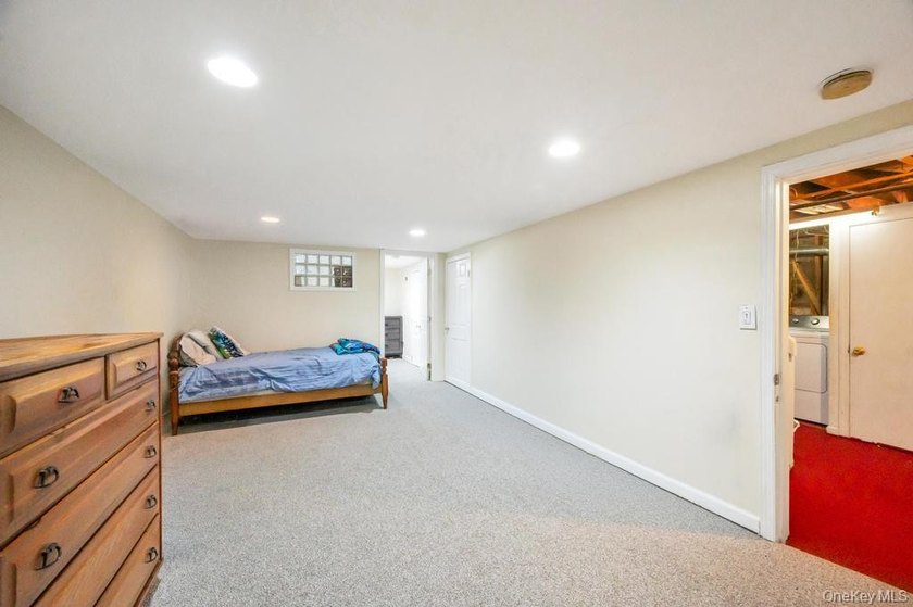 Welcome to this charming 3-bedroom, 2 full bathroom Cape nestled - photo 37