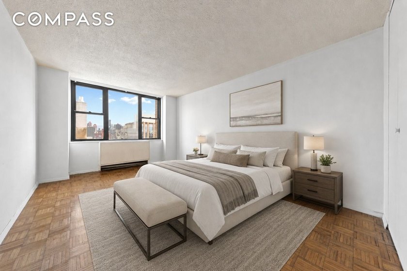 Welcome home to your light-filled corner residence at 201 East - photo 4